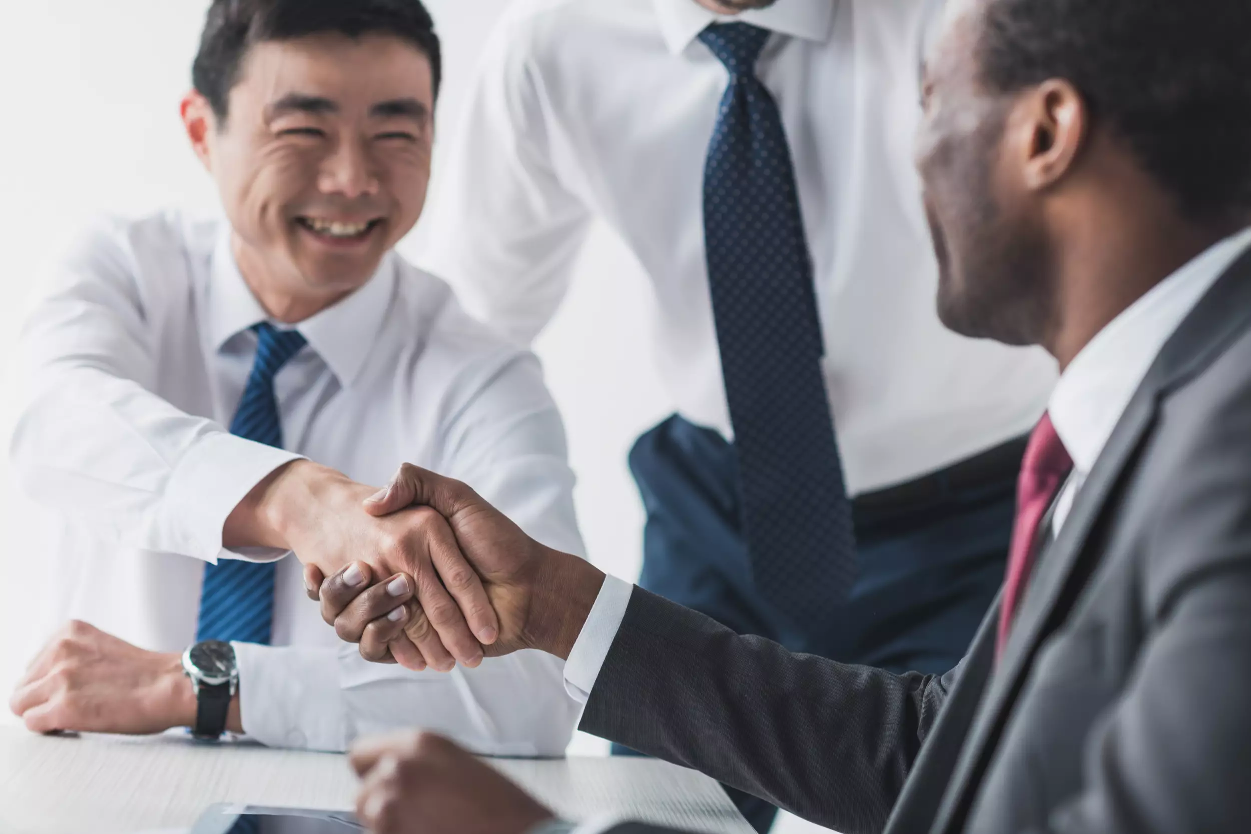 Lawyers and attorneys shaking hands